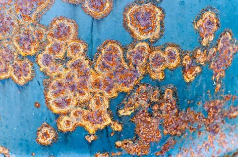 Texture rusty metal, rusty large scratches on metal, metal barrels orange rus Stock Photos