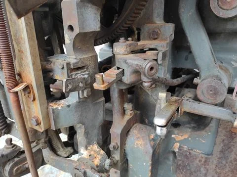 Texture of rusty old mechanism. Old printing press. Museum of book printing.. Stock Photos