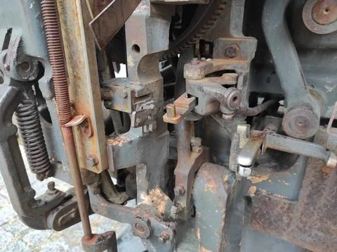 Texture of rusty old mechanism. Old printing press. Museum of book printing.. Stock Photos