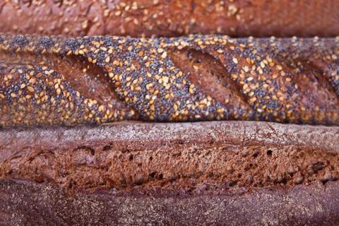 Texture of rye breads with cereals and seeds. Stock Photos