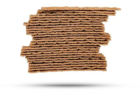 Texture of rye chips on a white background. The chips are stacked one on top of Stock Photos