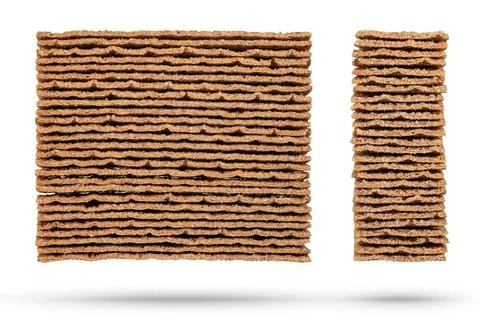 Texture of rye chips on a white background. The chips are stacked one on top of Stock Photos