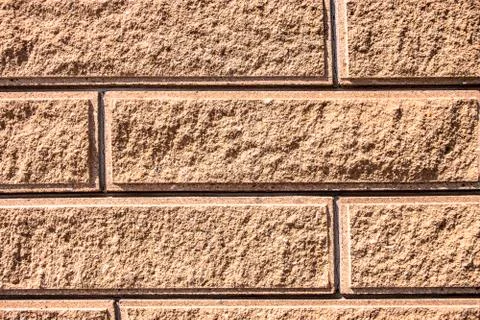 Texture of sand-colored bricks background close up Foto stock
