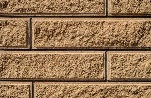 Texture of sand-colored bricks background close up Foto stock