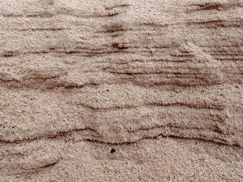 The texture of the sand wall. Stock Photos