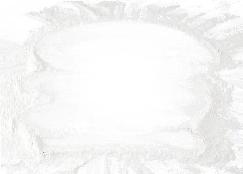 Texture of scattered white wheat flour with smudges and traces on the surface Stock Photos