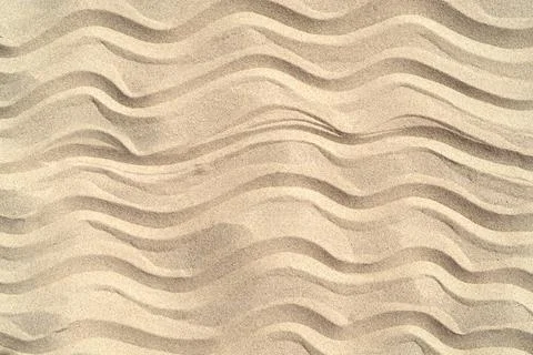 Texture of sea sand background closeup with ornament Stock Photos