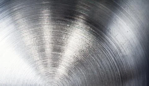 Texture of shining metal surface with circular milling Stock Photos