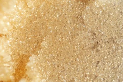 The texture of a shining scrub close-up. Stock Photos