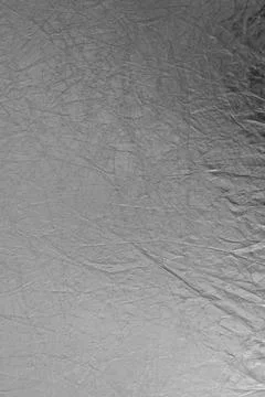 Texture of silver, fabric reflector, simple, stretched silver background. Stock Photos