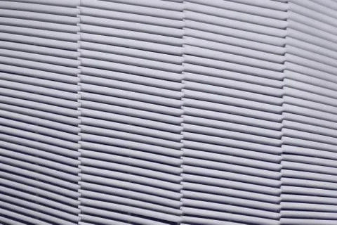 Texture of simple slanted lines. Background metal bars of the inclined strips Stock Photos