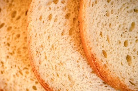 Texture of slices white bread as a close up background. backdrop of rough d.. Stock Photos
