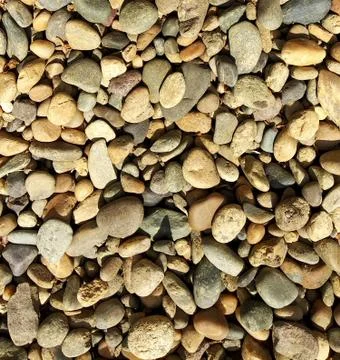 Texture of small sea pebbles multicolored for background and Wallpaper Stock Photos