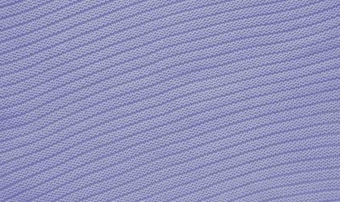 Texture of smooth knitted sweater with pattern. Handmade knitting wool or cotton 스톡 사진