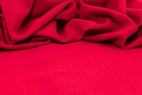 Texture of a smooth luxurious, elegant fabric in pink, purple, red. Purple .. Stock Photos