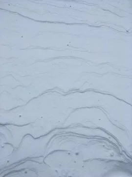 The texture of the snow layers driven by the wind Stock Photos