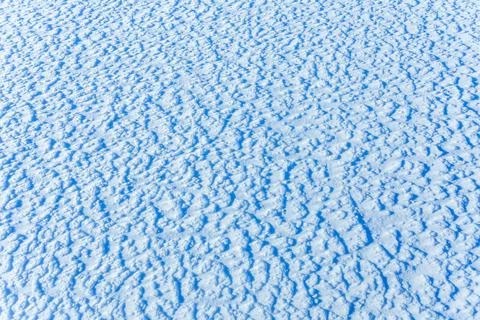 Texture of the snow, white blue pattern of the snow, cold day, natural winter Stock Photos