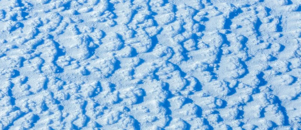 Texture of the snow, white blue pattern of the snow, cold day, natural winter Stock Photos