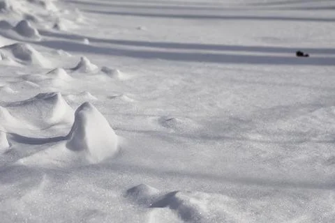 The texture of the snow. Winter rainfall. Tracks on a snowy road after a sn.. Stock Photos
