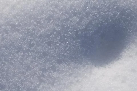 Texture of a snowdrift close-up in winter Stock Photos