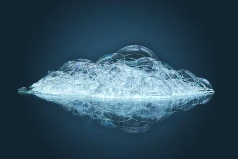 The texture of soap bubbles and foam in close-up on a blue background. Stock Photos