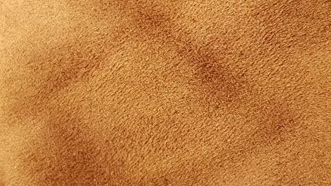 Texture of soft brown suede material. 库存照片