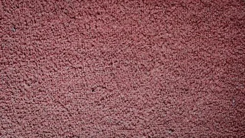 Texture of soft, warm fabric in deep red hues inviting touch and warmth in .. Stock Photos