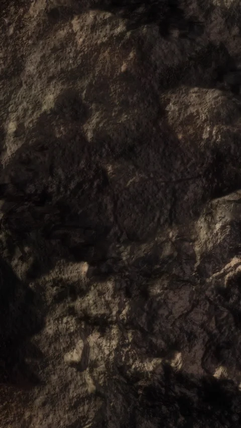 Texture of soil and rocks in a natural setting during daylight hours Stock Footage 345008704