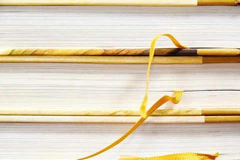 Texture of the stack of closed books with white paper sheets Stockfoto's