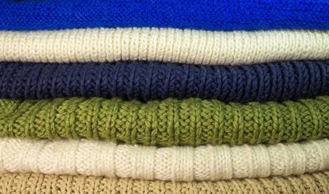Texture. Stack of knittings. Colorful handmade knitwear Stock-Fotos