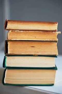 The texture is a stack of old books Stock Photos