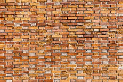 Texture of stained old brick wall background Stock Photos