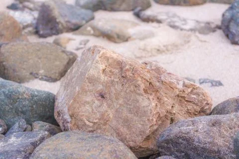 Texture of stone background close-up part of the wall of natural stone lined Stock Photos
