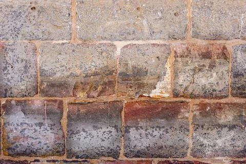 Texture of a stone brick wall without finishing Stock Photos