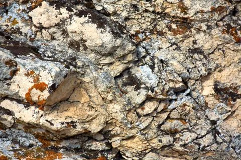 The texture of the stone close-up with streaks. Stock Photos