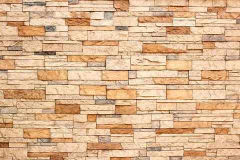 Texture of stone. Masonry. Decorative facing of facades, walls. Stock Photos