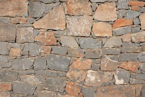 Texture of a stone. Old stone wall texture background. Grey stone wall as a b Foto stock