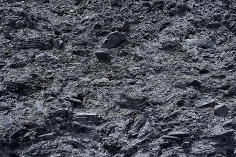 The texture of the stone surface of the mountain with minerals in monochrome  Stock Photos