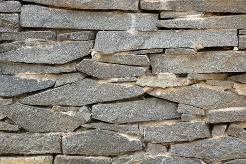 Texture of stone wall as background, closeup Stock Photos