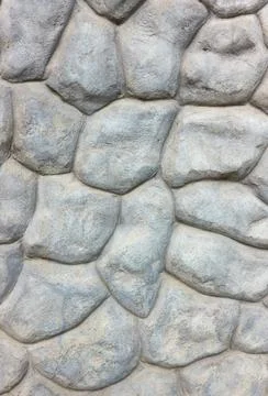 Texture of a stone wall for background, cobblestone masonry Stock Photos