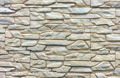 Texture of the stone wall. Background for design and decoration. Stock Photos