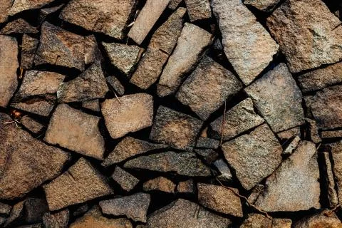 The texture of the stone wall. Background of stone wall. Natural materials Stock Photos