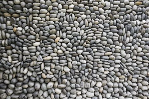 Texture of the stone wall for background . Stone wall of cobblestones backg.. Stock Photos