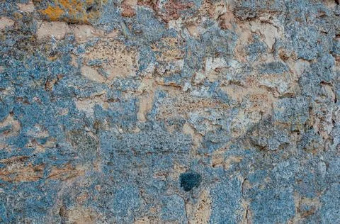 The texture of the stone wall. Background texture of the stone wall of the ol Stock Photos