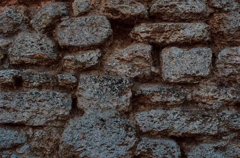 The texture of the stone wall. Background texture of the stone wall of the ol Foto stock