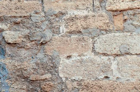 The texture of the stone wall. Background texture of the stone wall of the ol Stock Photos