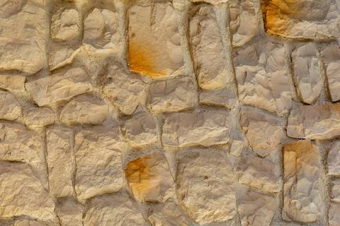 The texture of the stone wall. Background texture of the stone wall of the ol Stock Photos