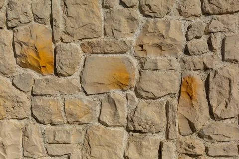 The texture of the stone wall. Background texture of the stone wall of the ol Stock Photos