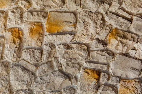 The texture of the stone wall. Background texture of the stone wall of the ol Stock Photos