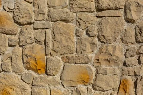 The texture of the stone wall. Background texture of the stone wall of the ol Stock Photos